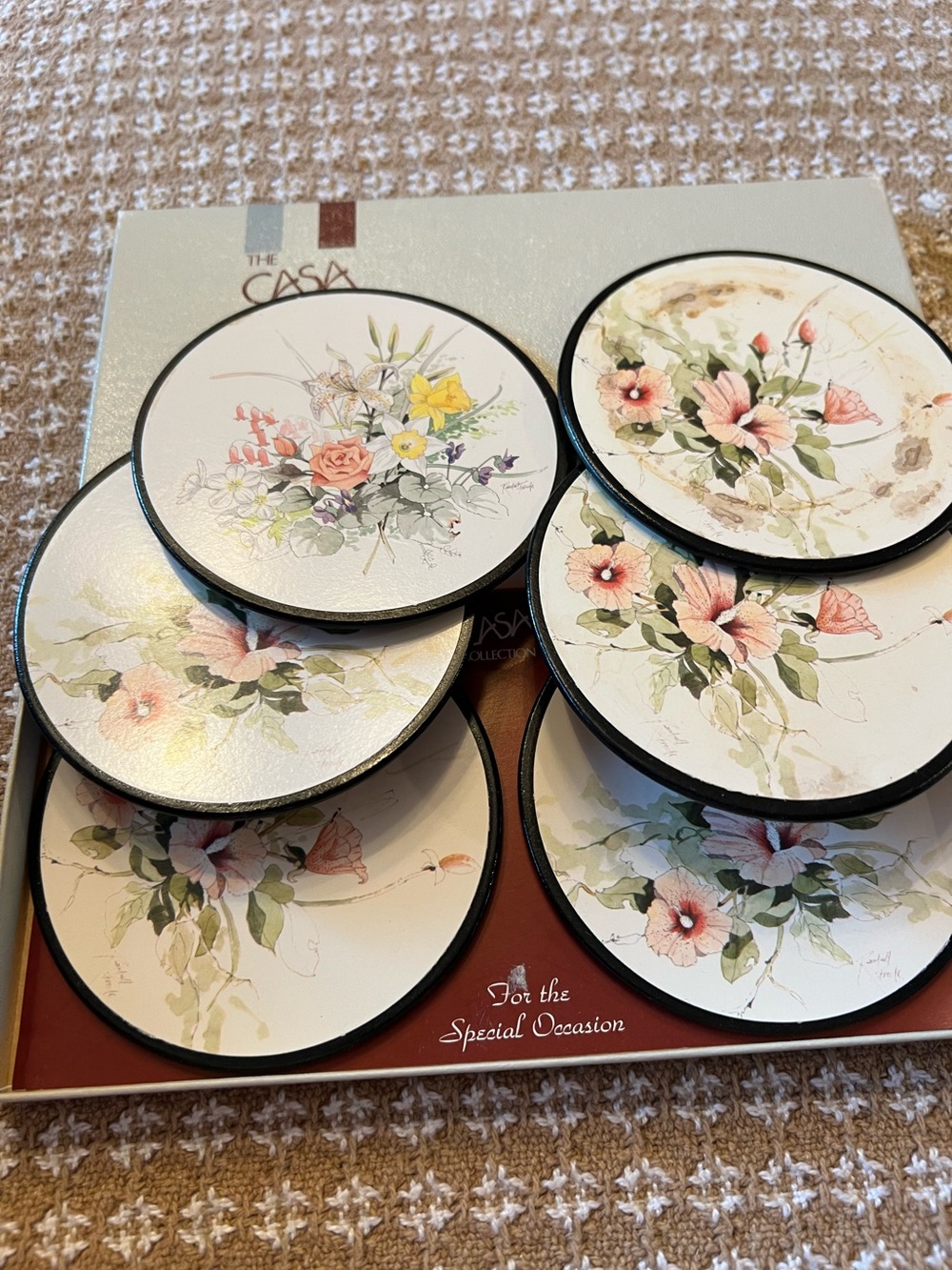 The Casa Collection Set of 6 cork backed floral design coasters in original box
